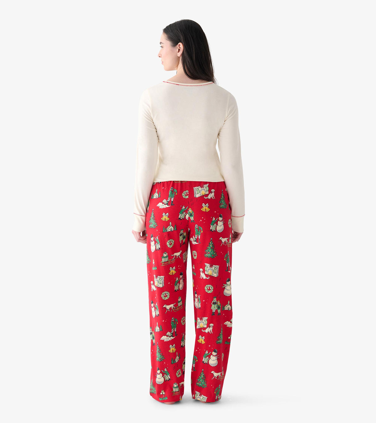 Back view of women's cream long-sleeve top with long sleeves and red trim at the neckline and cuffs