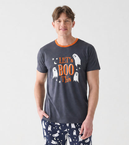 Model wearing charcoal Let's Boo This T-shirt with orange neckline and ghost graphic, shown from chest up