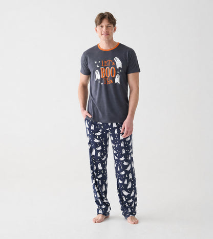 Full front view of model wearing charcoal ghost graphic T-shirt with orange neckline