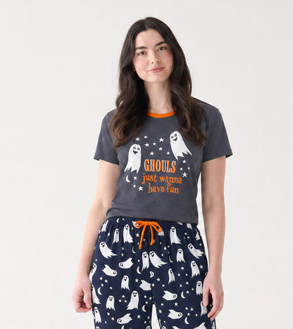 Model wearing gray pajama T-shirt with orange collar, ghost graphic, and matching navy ghost print pants