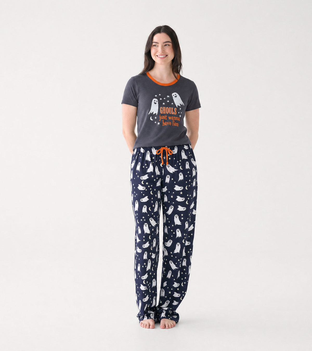Front view of gray Halloween pajama T-shirt styled with navy ghost print pants and orange drawstring