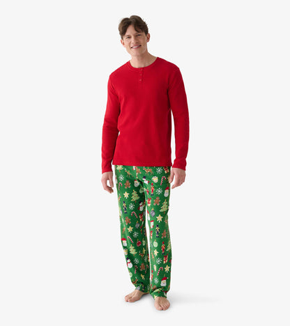 Men's red waffle henley shown full length from the front with green holiday print pajama pants