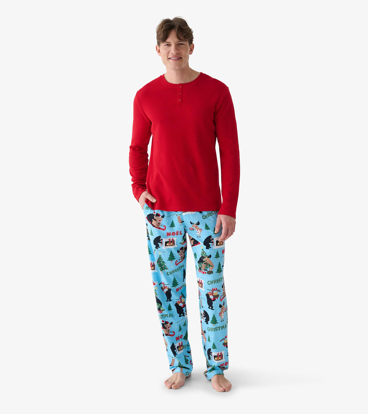 Men's red waffle henley shown from the front with light blue holiday print pajama pants