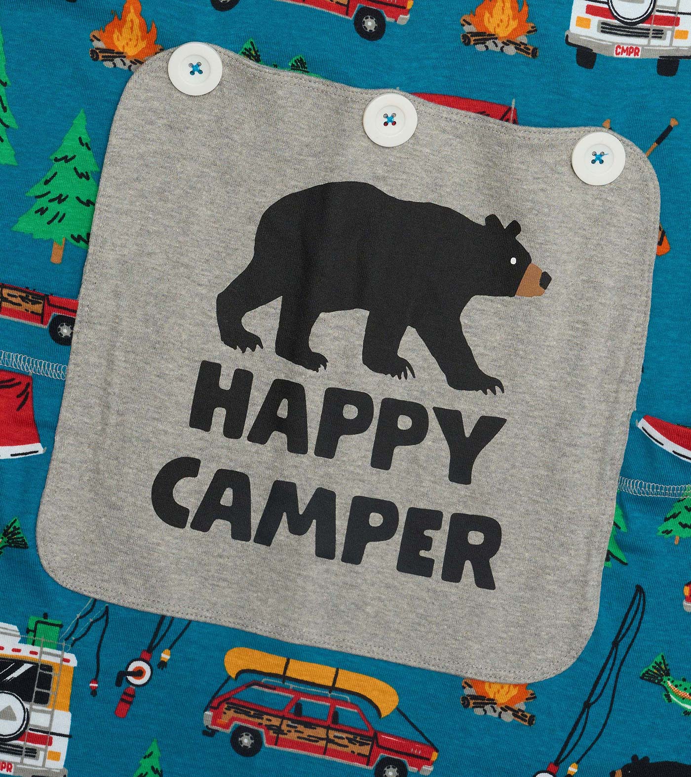 Gray chest patch with black bear and “HAPPY CAMPER” text on blue camping-print onesie fabric