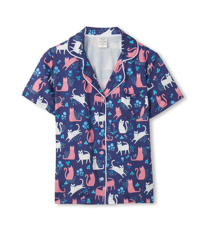 Navy short-sleeve button-down pajama top with pink and white cat print and contrast piping, front view
