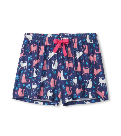 Navy polyknit pajama shorts with pink and white cat print, elastic waistband, and pink drawstring.