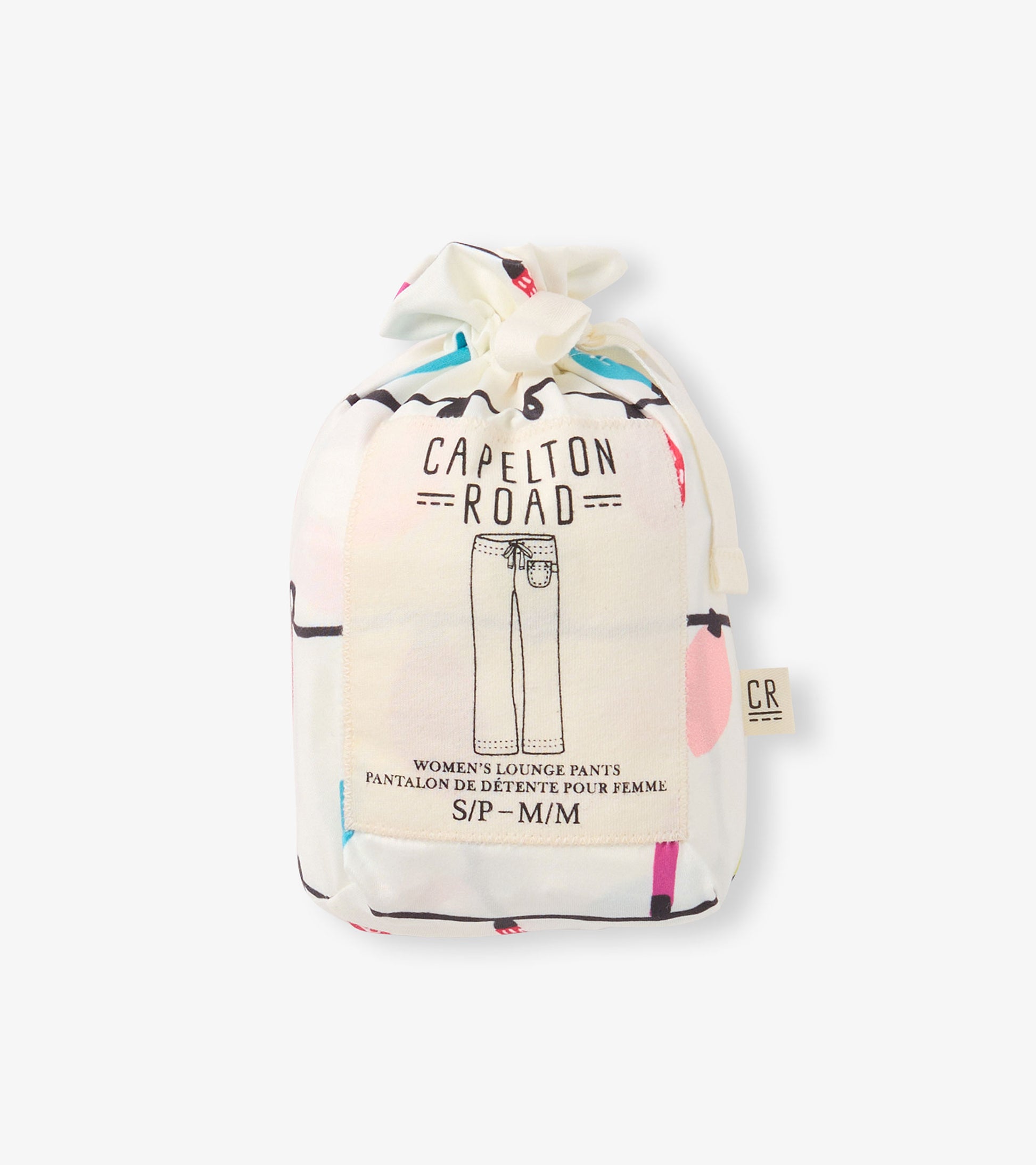 White pajama pants with colorful geometric patterns, packaged in a drawstring bag. Size options available.