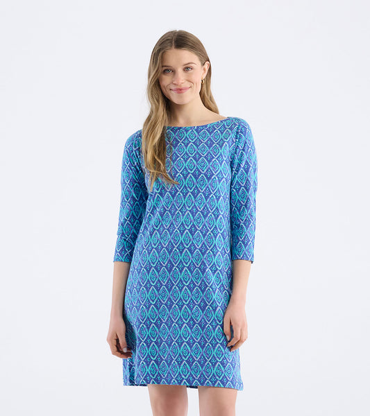 Blue bateau dress featuring a painted diamond pattern and three-quarter sleeves, suitable for casual wear.