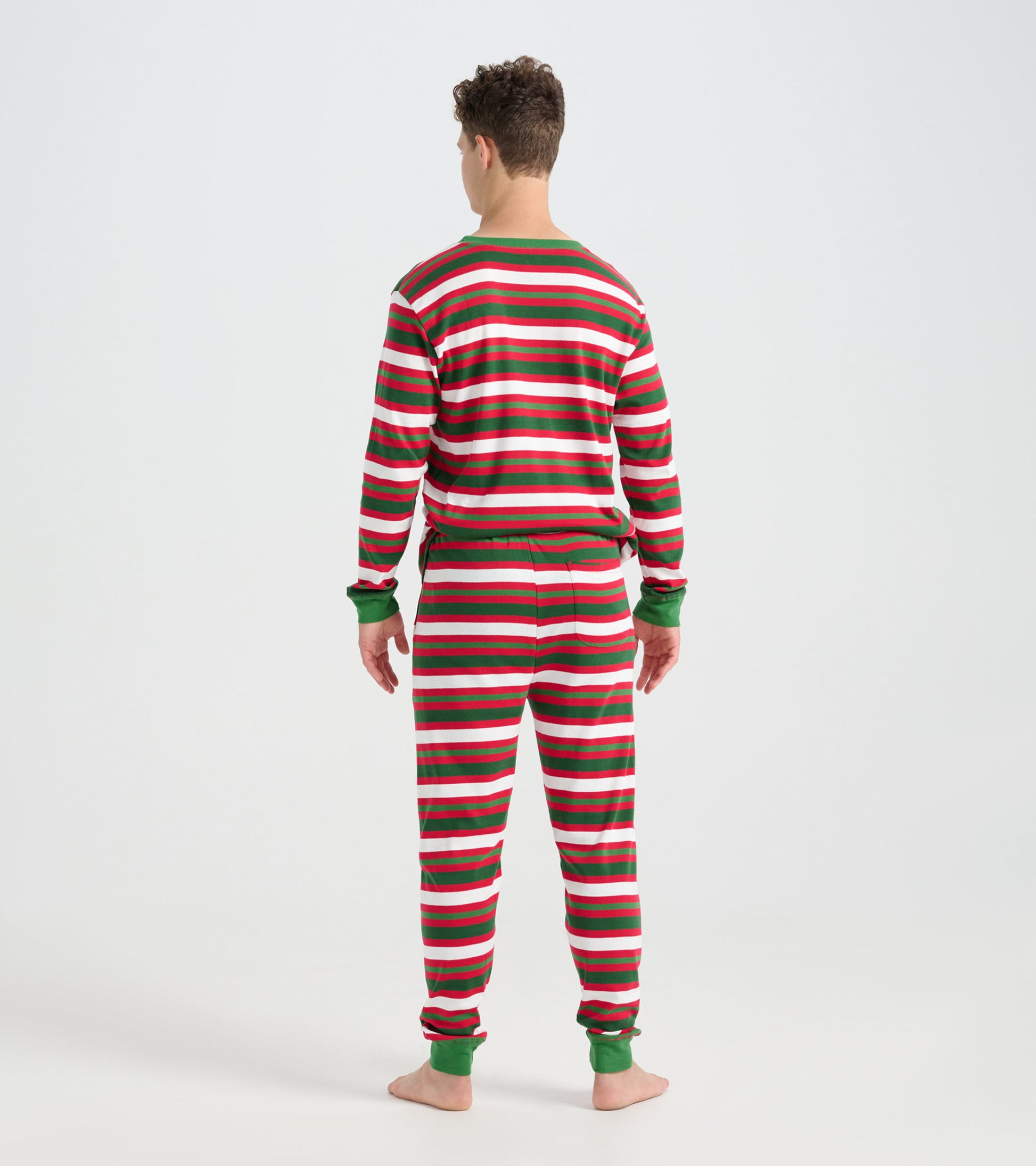 Men's pajama set featuring a candy cane stripe pattern in red, green, and white, shown from the back.