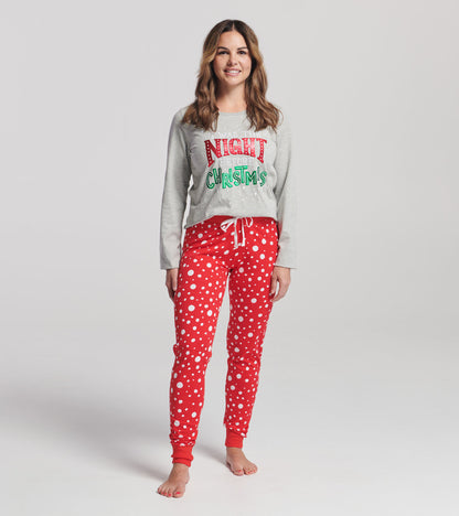 Red polka dot sleep leggings with a drawstring waist, perfect for Christmas lounging.
