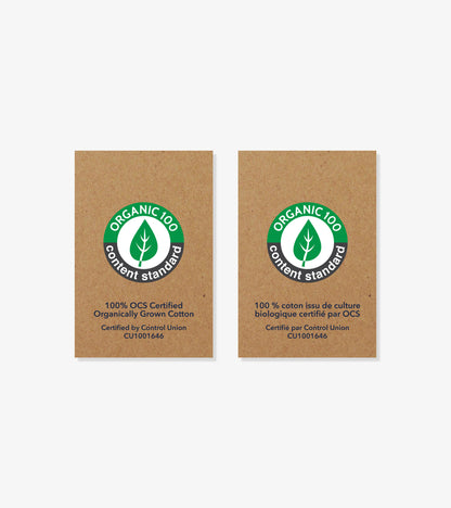 Organic cotton certification labels featuring green and black logos on a brown background.