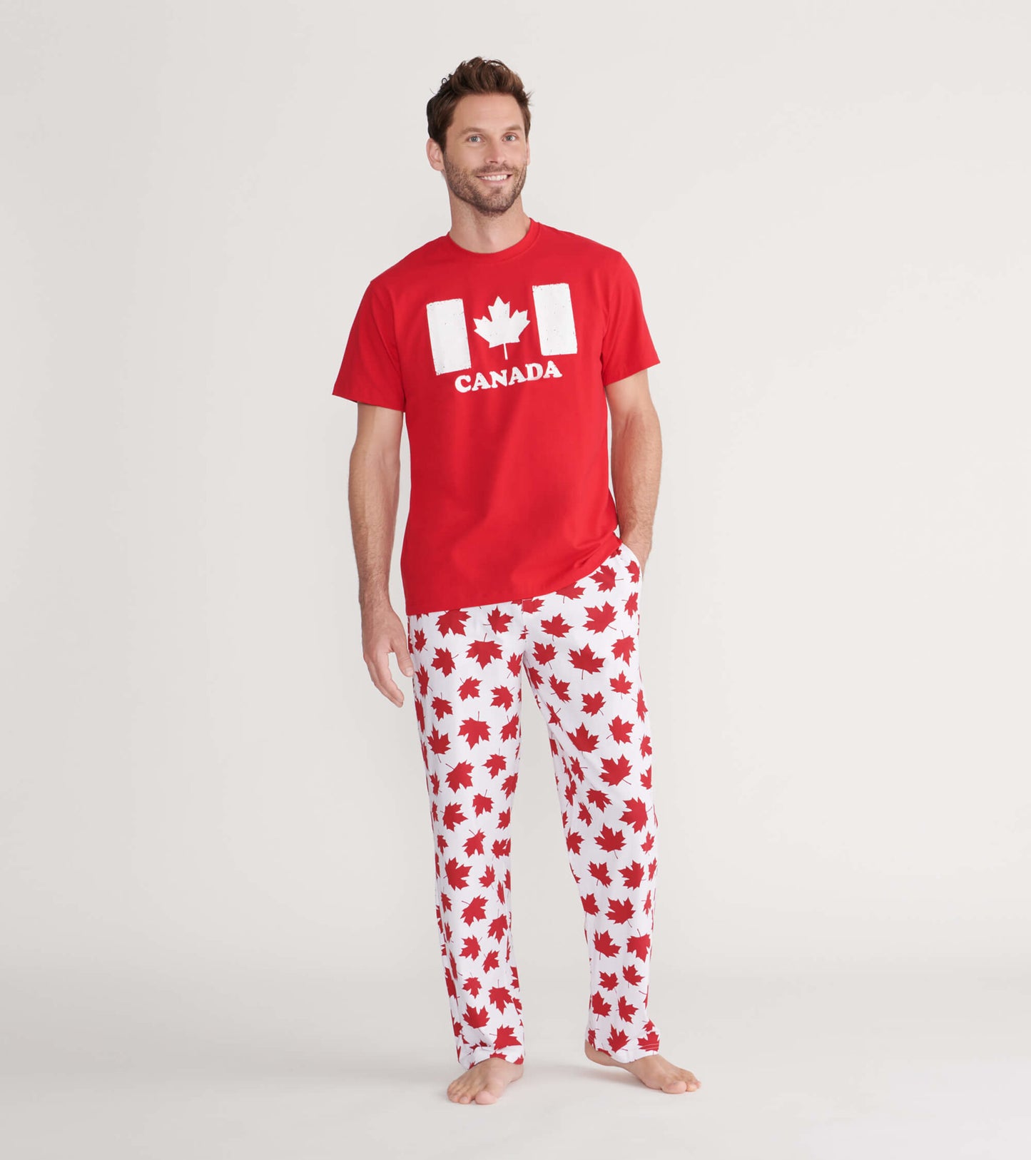 Men's pajama pants in white with red maple leaf pattern, made of stretch cotton, suitable for lounging or sleepwear.