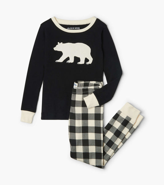 Cream plaid pajama set featuring a black long-sleeve top with a bear appliqué and matching checkered pants.