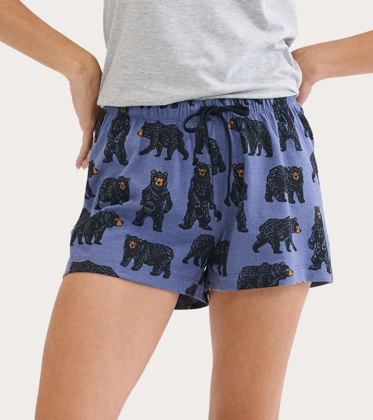 Cotton blend sleep shorts in blue featuring a playful bear pattern and an elastic waistband with a drawstring.