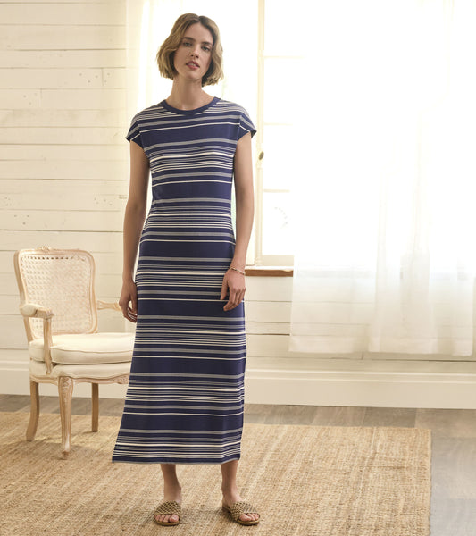 Patriot blue striped maxi dress with short sleeves and a round neckline, styled with casual sandals.