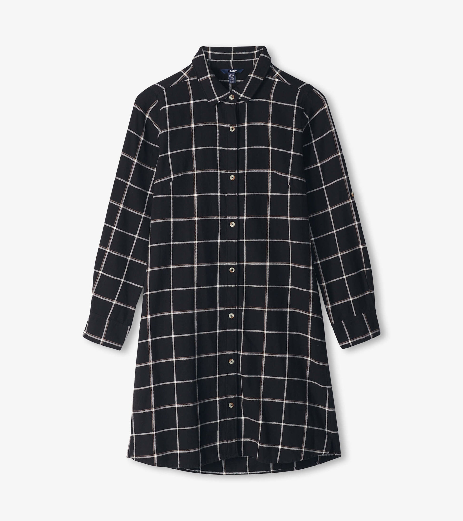 Black shirt dress featuring a white windowpane pattern, long sleeves, and a button-down front.
