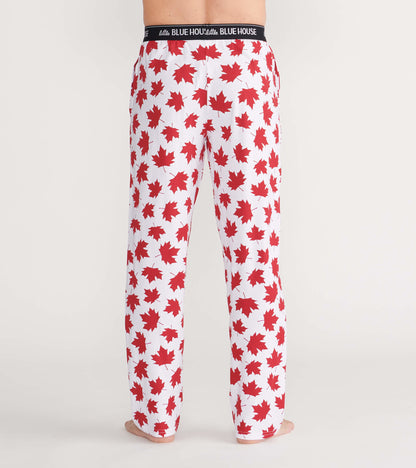 Men's pajama pants in white with a red maple leaf pattern, featuring an elastic waistband, shown from the back.