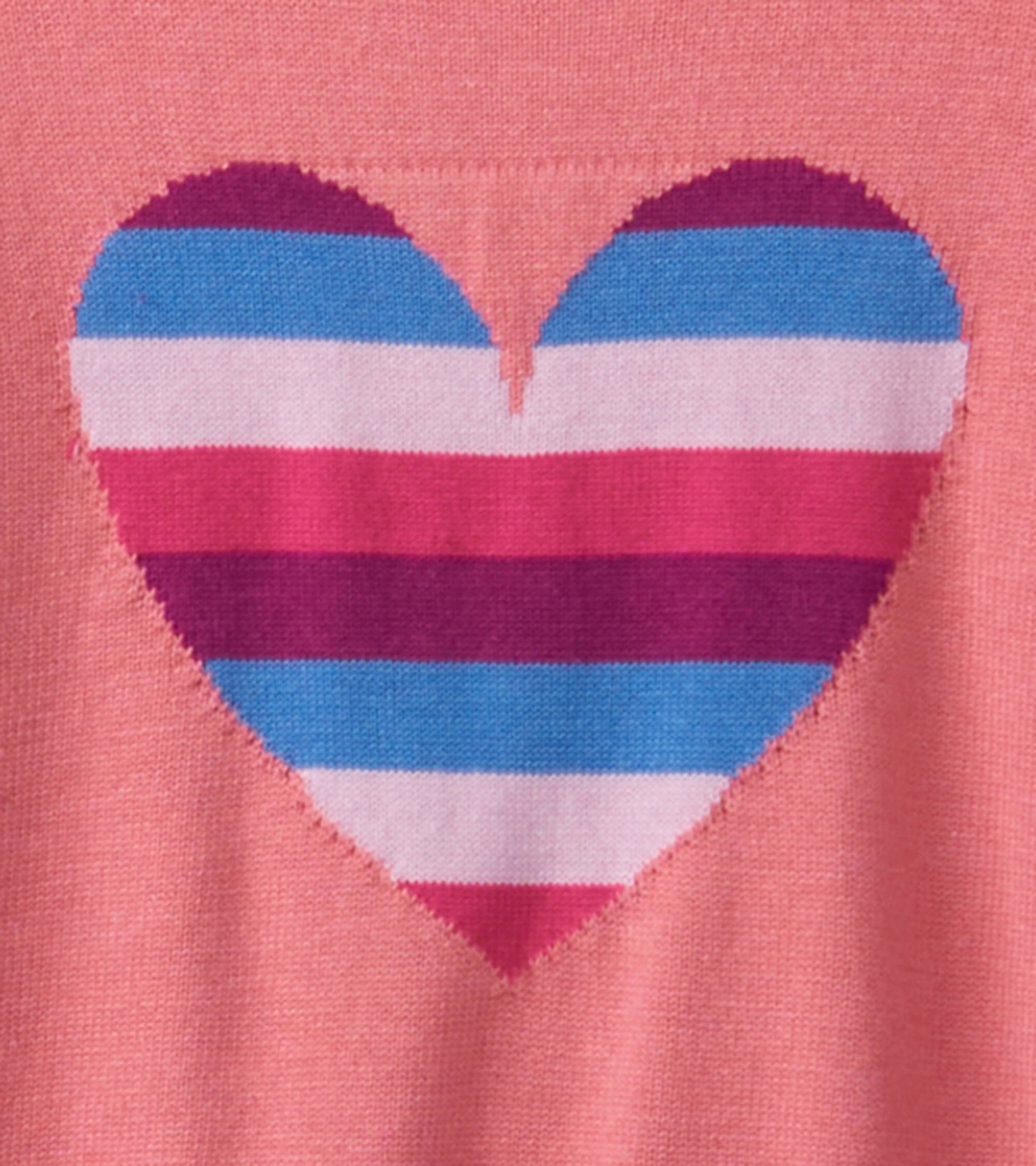 Pink sweater featuring a striped heart design in blue, pink, and purple with ruffle sleeves.