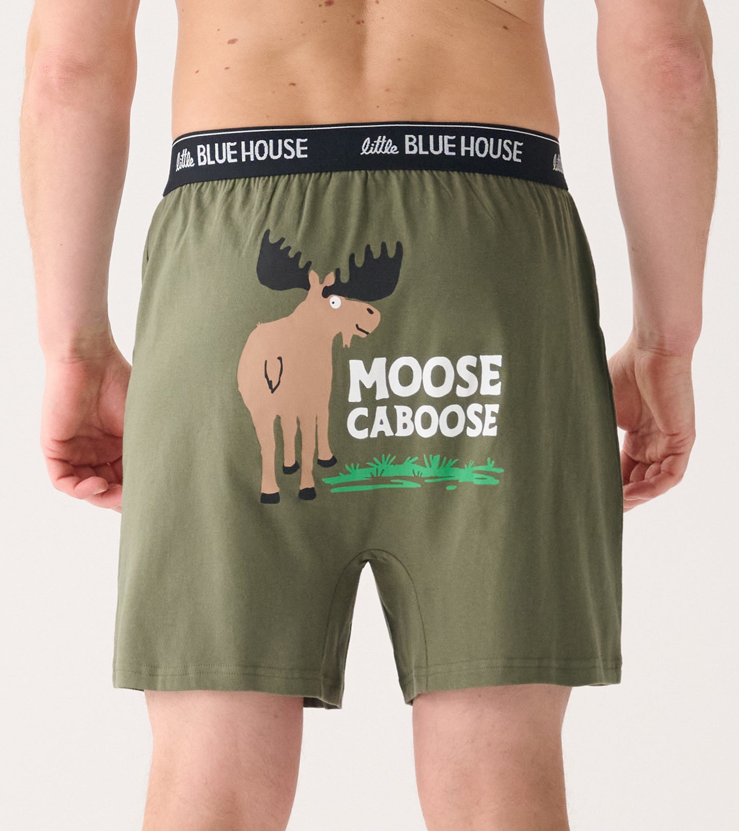 Men's olive green boxer shorts featuring a moose graphic and "MOOSE CABOOSE" text on the back.