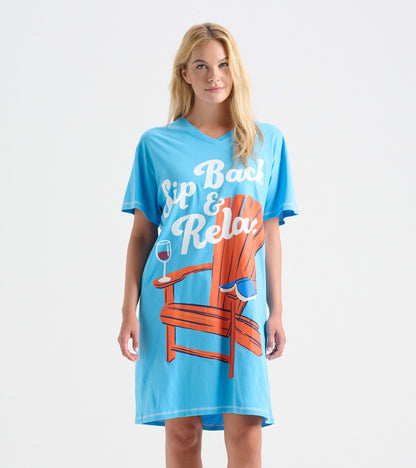 Light blue women's sleepshirt featuring a graphic of an Adirondack chair, wine glass, and the phrase "Sip Back & Relax.