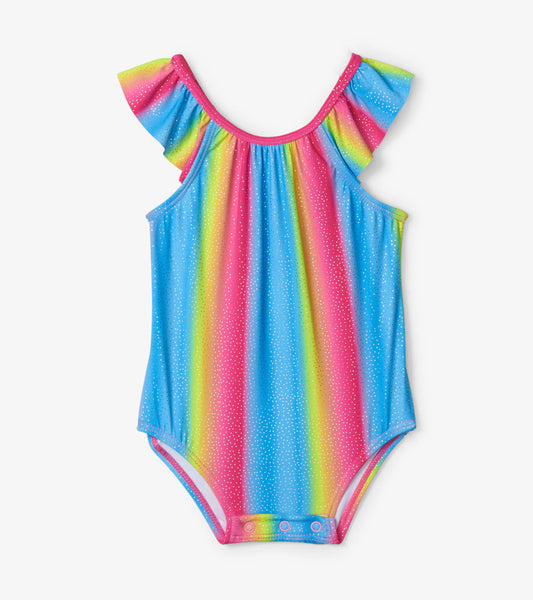 Colorful rainbow ruffle swimsuit featuring a polka dot pattern and snap closure at the bottom, suitable for infants.