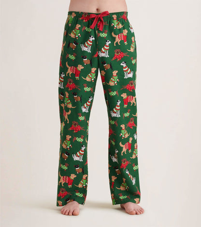Green flannel pajama pants featuring a festive dog pattern, with a red drawstring and relaxed fit.