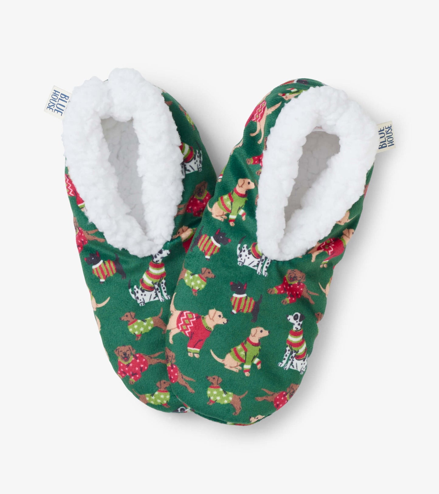 Green slippers with a cozy white lining, featuring a festive dog pattern in holiday attire.