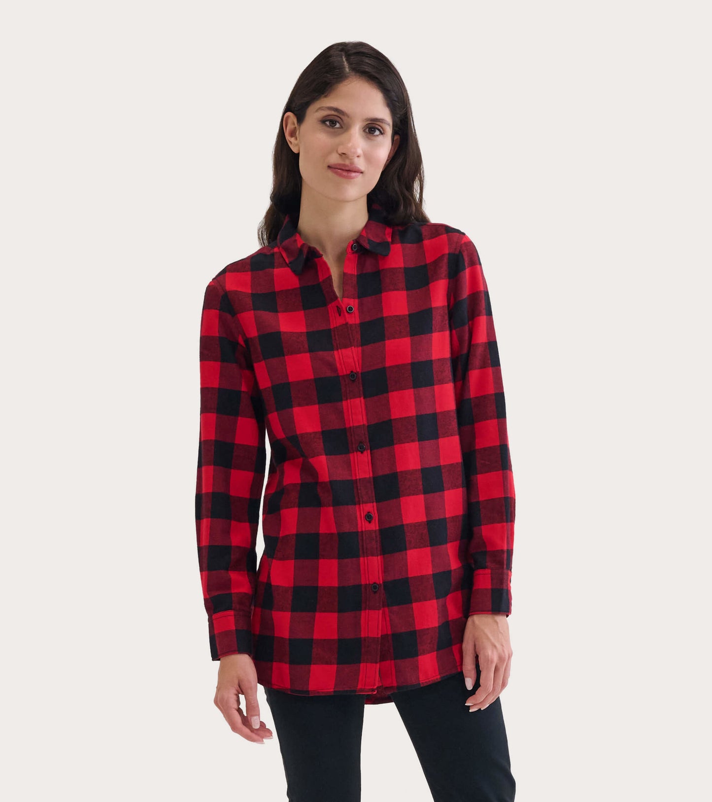 Red and black buffalo plaid flannel tunic with a button-up front and long sleeves, styled for a relaxed fit.