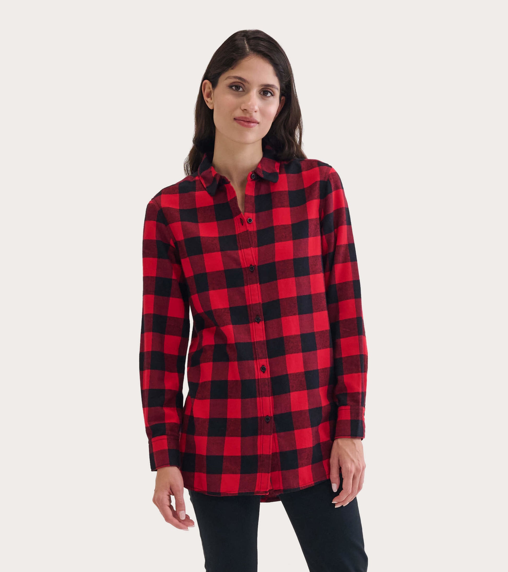 Red and black buffalo plaid flannel tunic with a button-up front and long sleeves, styled for a relaxed fit.