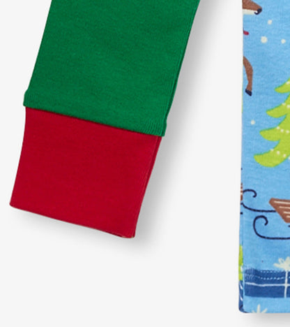 Green and red raglan sleeves with a blue pajama bottom featuring a festive holiday print. Organic cotton material.