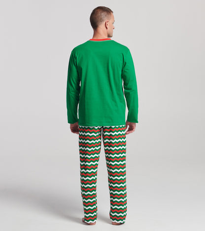 Green long sleeve t-shirt with a red collar, worn with patterned pajama pants featuring zigzag stripes in red, green, and wh…