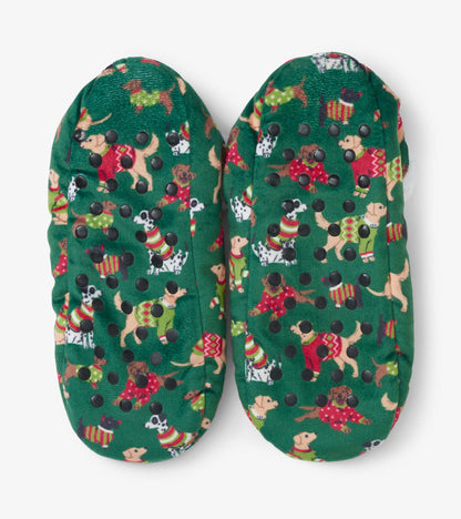 Green slippers featuring a playful dog pattern, with a soft texture and rubberized soles for grip.