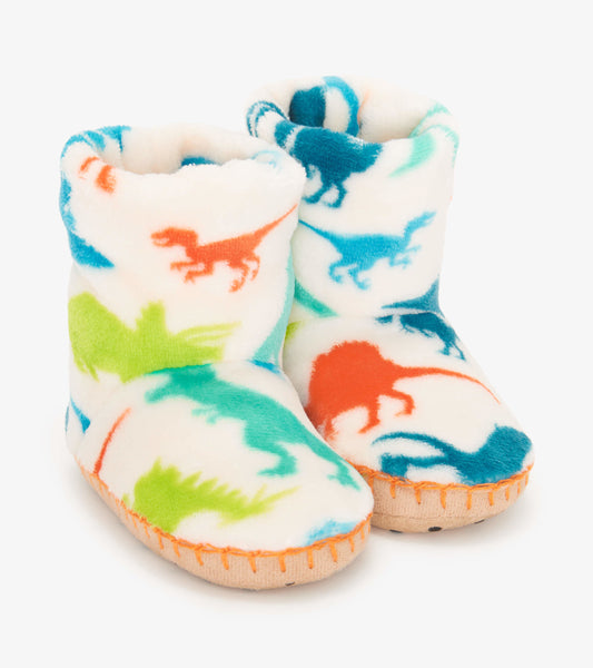 Fleece slippers featuring colorful dinosaur patterns, with a soft interior and a durable sole for kids.