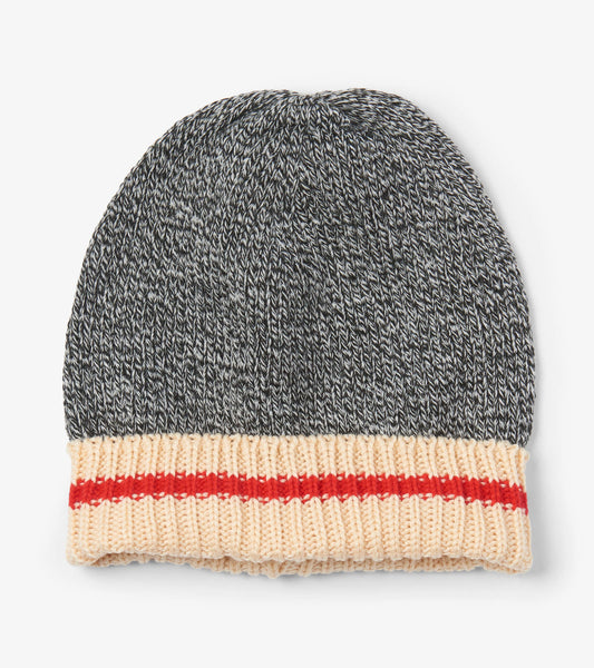 Knitted winter hat in gray with a cream cuff featuring a red stripe, designed for warmth and style.