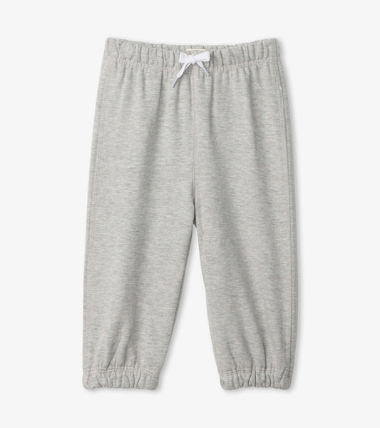 Grey French terry baby joggers with an elastic waistband and cuffed ankles, suitable for casual wear.