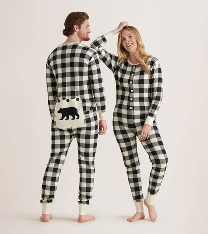 Cream plaid adult onesie featuring a bear design on the back, with button closure and ribbed cuffs.
