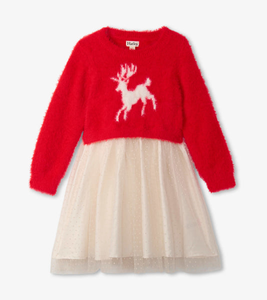 Red fuzzy top with white deer design and a cream tulle skirt featuring polka dots, suitable for holiday occasions.