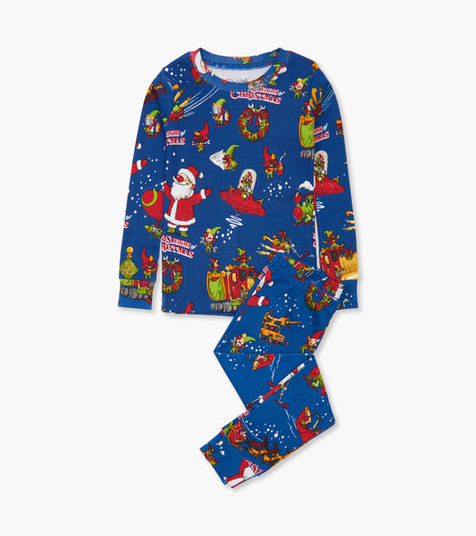 Blue pajama set featuring festive Christmas patterns with Santa, elves, and holiday motifs. Long-sleeve top and matching pan…