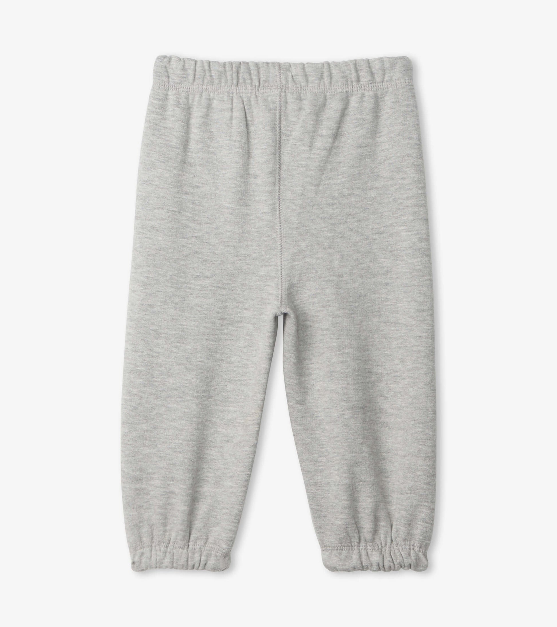 Light grey French terry baby joggers with an elastic waistband and gathered cuffs. Suitable for infants.