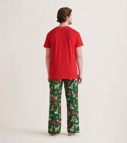 Green flannel pajama pants featuring a festive dog and floral pattern, paired with a red short-sleeve shirt.