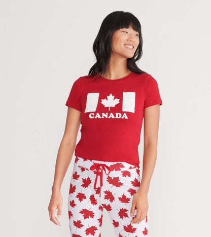Red short-sleeve tee featuring a white Canada graphic and maple leaf design, worn with matching leaf-patterned pants.