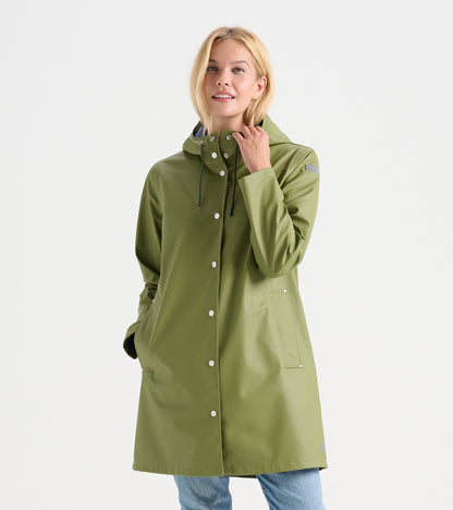 Loden green waterproof rain jacket with a hood, snap buttons, and side pockets, styled for a casual look.