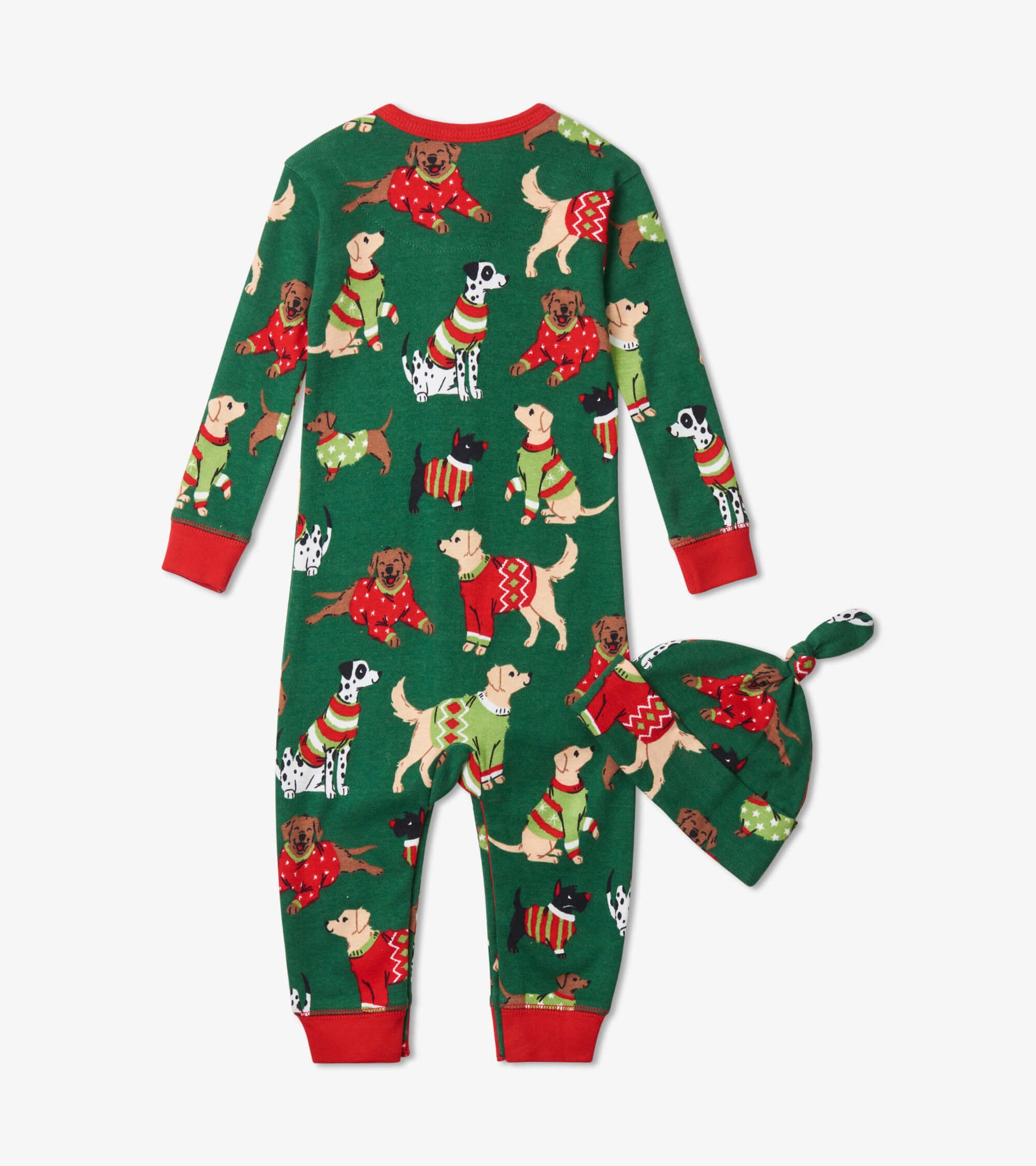 Green sleeper with festive dog patterns and red accents, paired with a matching hat. Suitable for babies 3-24 months.