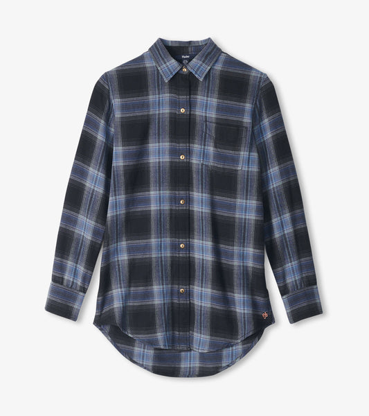 Caviar plaid tunic in black and blue with a button-up front, long sleeves, and a curved hem.