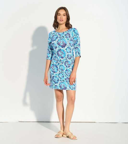 Blue dress with a floral mandala pattern, featuring three-quarter sleeves and a relaxed fit, worn with sandals.