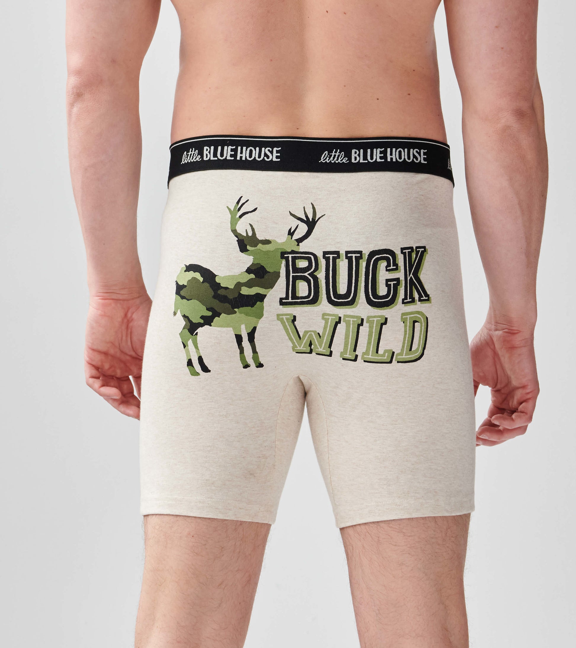 Men's boxer briefs in light beige with a camo deer graphic and "BUCK WILD" text on the back.