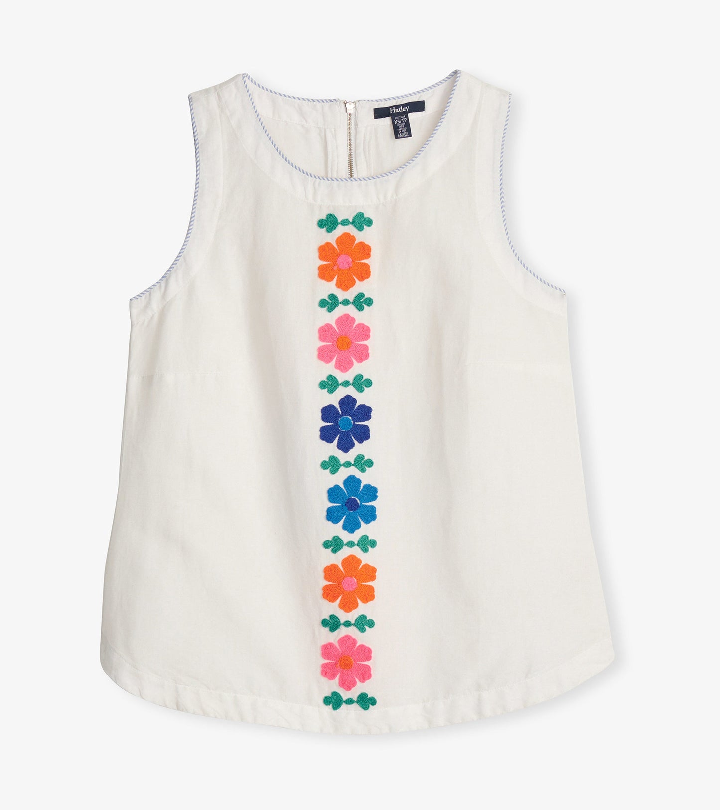 White tank top featuring colorful embroidered flowers down the center, with a round neckline and a back zipper.