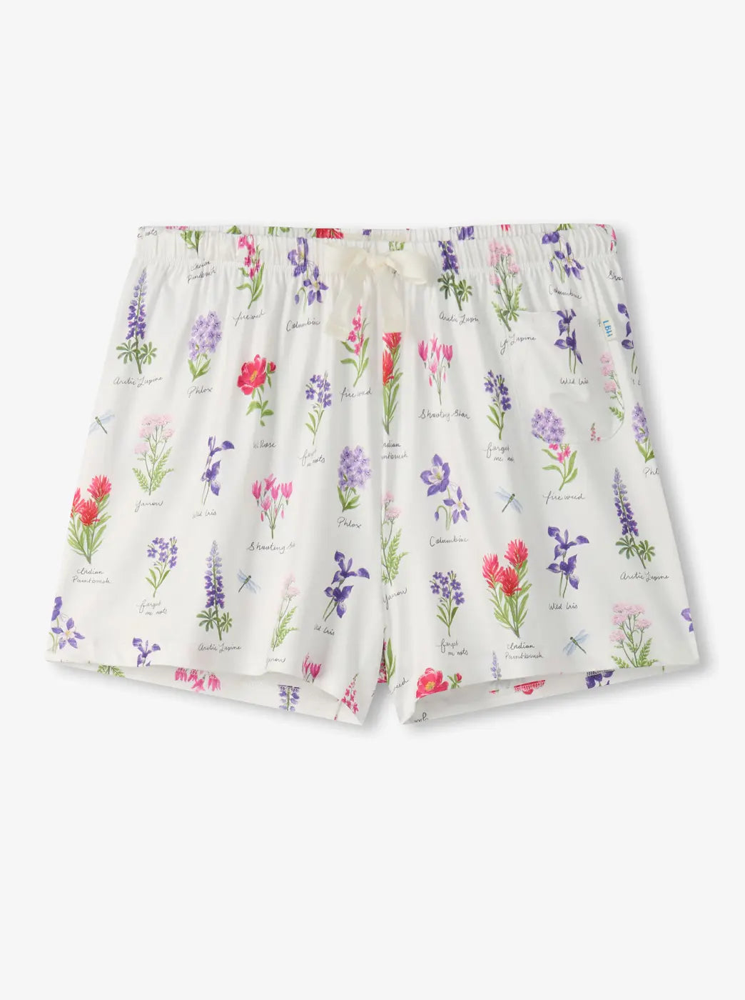 Shop women's pajama shorts. Showing white pajama shorts with a colorful floral print on a plain background.